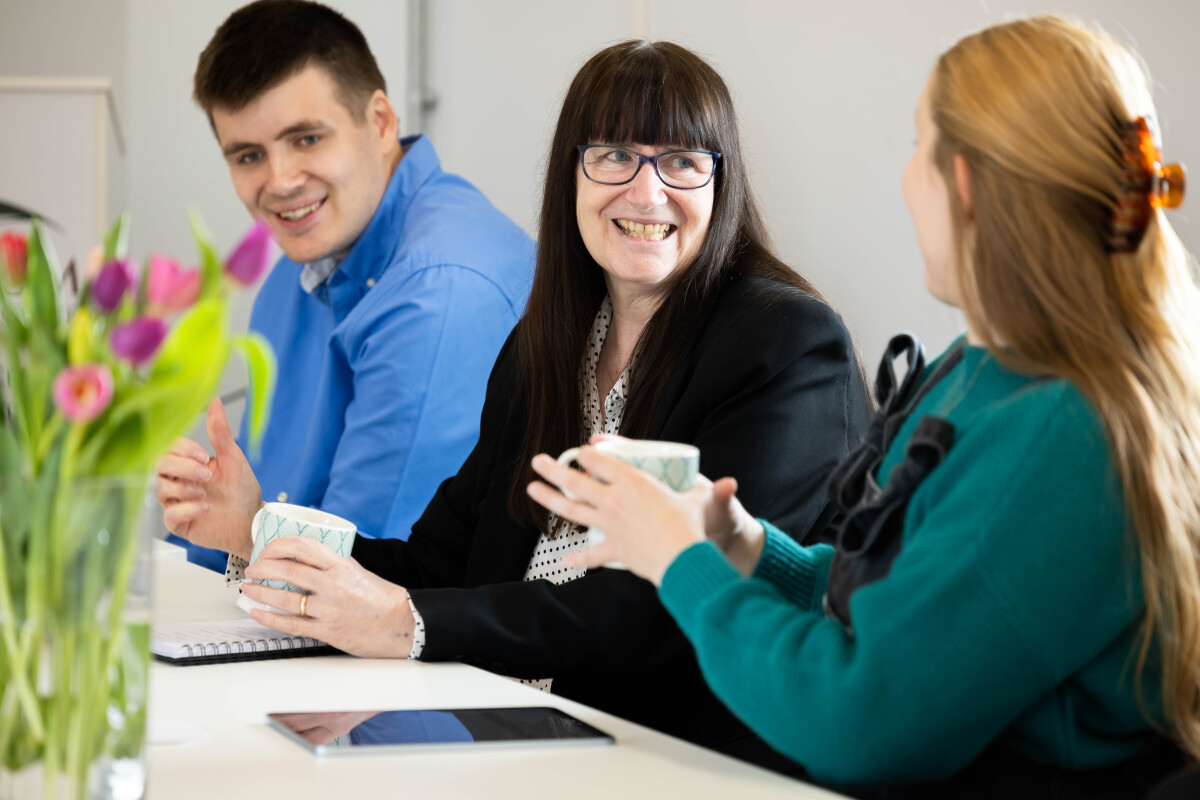 Carol having a conversation about quality management systems 
